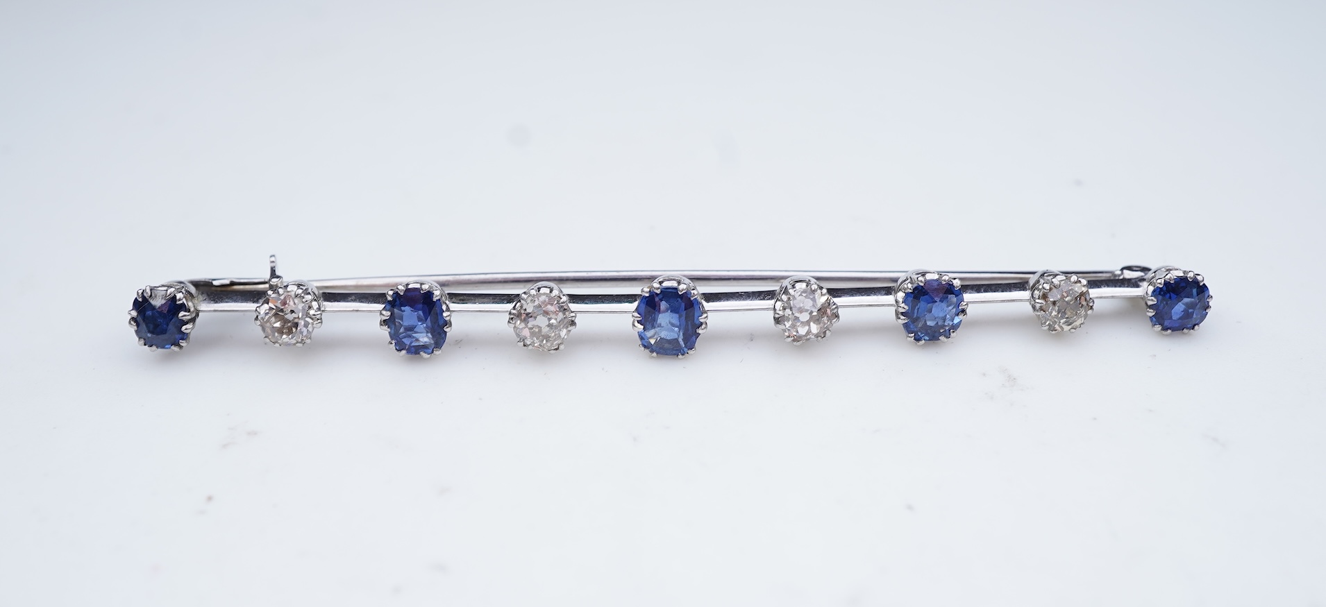 A diamond and sapphire bar brooch, early 20th century
